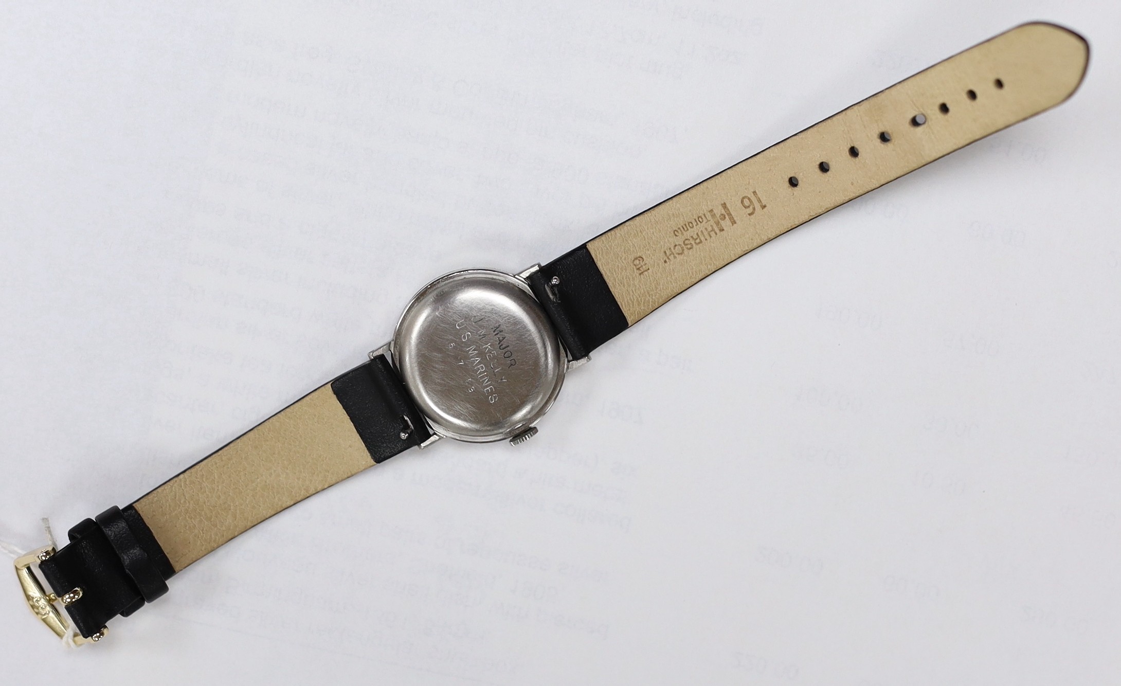 A gentleman's WWII stainless steel Elgin military wristwatch, the case back engraved 'Major J.M. Kelly US Marines, with Arabic dial, case diameter 30mm, on later associated leather strap.
